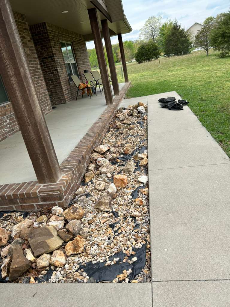 Garden pathway installation with stepping stones